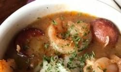 Cup of gumbo with sausage and shrimp
